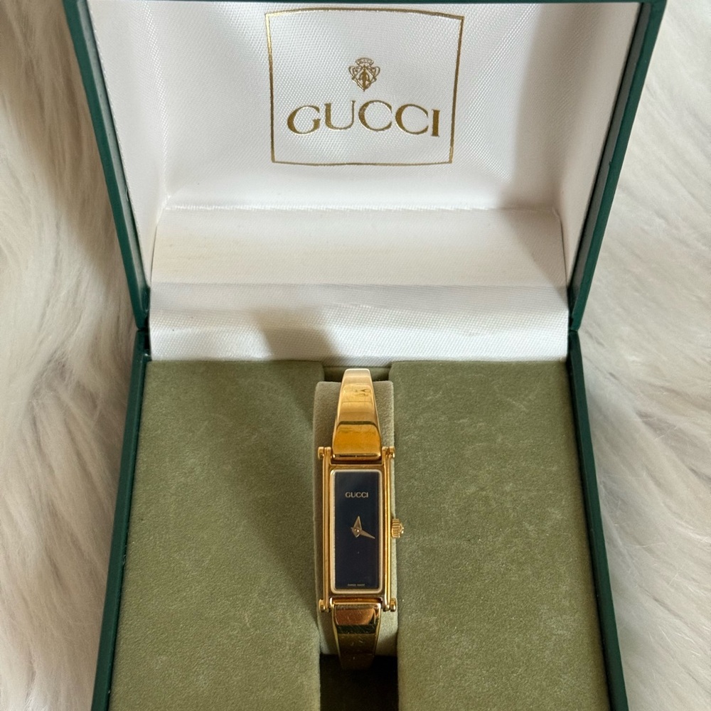 Gucci 1500L Series Gold and Black Rectangular Watch
